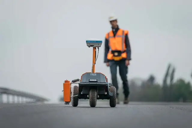 Robot Plotter for road marking & striping - Autonomous pavement premarking robot by Tyker